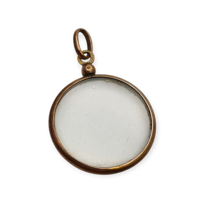 Circular gilded metal and glass locket, antique photo holder, c. 1900