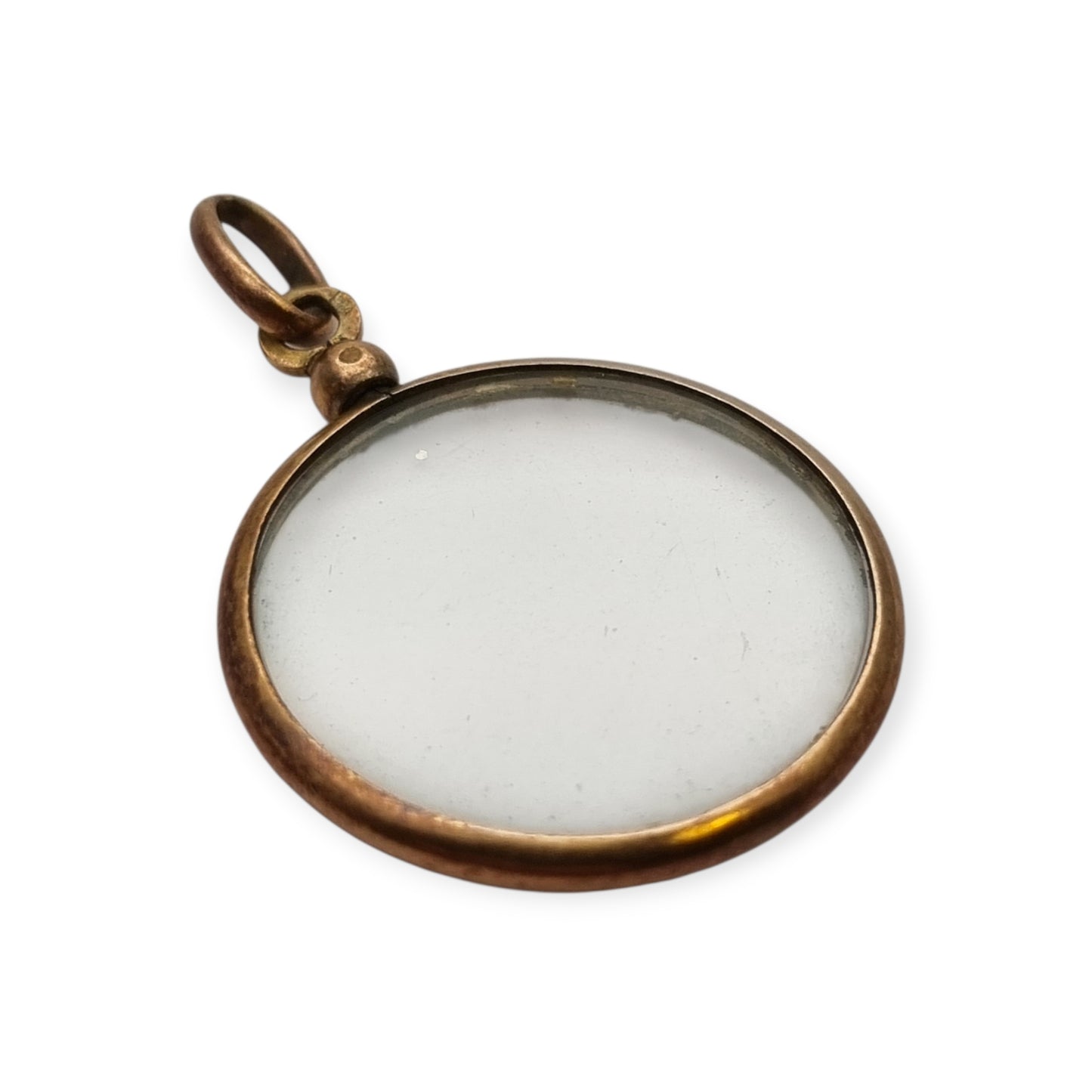Circular gilded metal and glass locket, antique photo holder, c. 1900