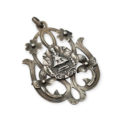 Colgante modernista de plata Nuestra Señora de Montserrat, La Moreneta, joyería religiosa, 1920