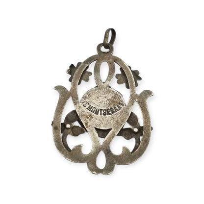 Colgante modernista de plata Nuestra Señora de Montserrat, La Moreneta, joyería religiosa, 1920