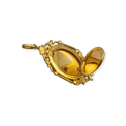 Guardapelo modernista chapado en oro grabado floral francés Marius Legros circa 1910
