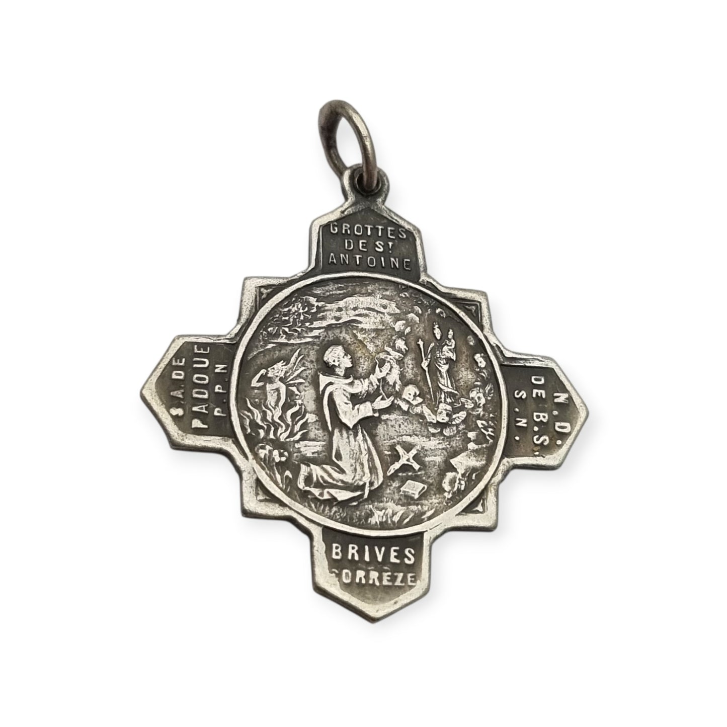 Catholic devotional silver-tone metal Saint Anthony of Padua cross medal, circa 1970