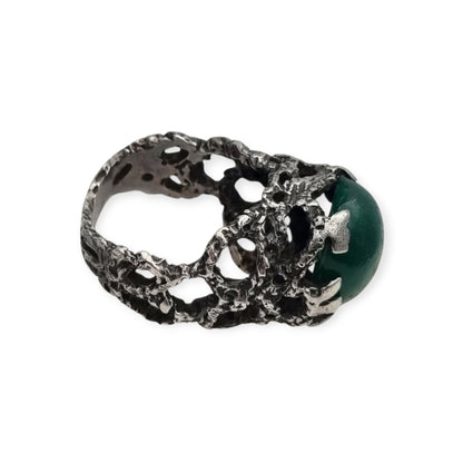 Brutalist textured silver ring with green cabochon organic design circa 1970