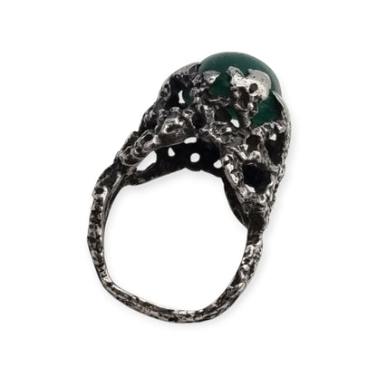 Brutalist textured silver ring with green cabochon organic design circa 1970