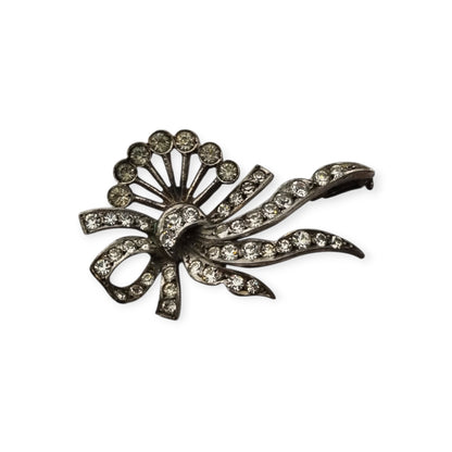 Antique Art Deco silver brooch with floral bouquet and white rhinestone bow circa 1930