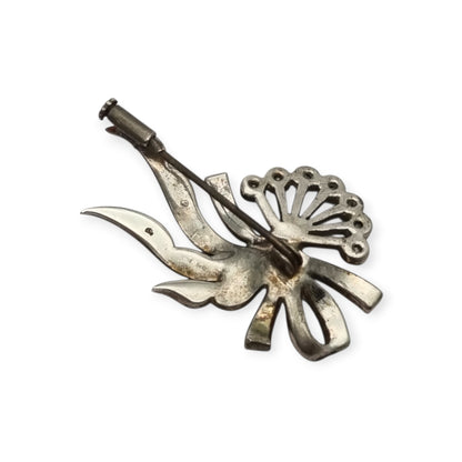 Antique Art Deco silver brooch with floral bouquet and white rhinestone bow circa 1930