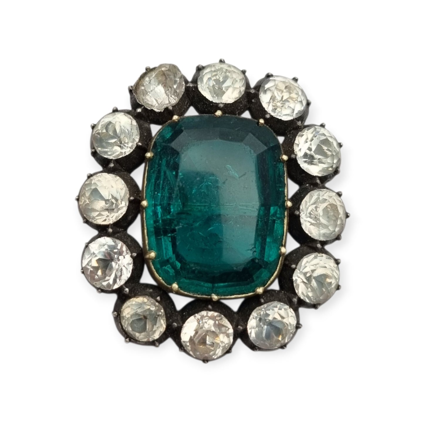 Antique Victorian silver, gold, and green and white paste brooch, inspired by the aesthetics of Queen Victoria's jewelry. Europe, circa 1890