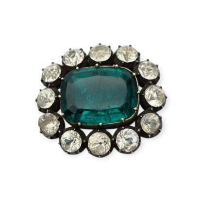 Antique Victorian silver, gold, and green and white paste brooch, inspired by the aesthetics of Queen Victoria's jewelry. Europe, circa 1890