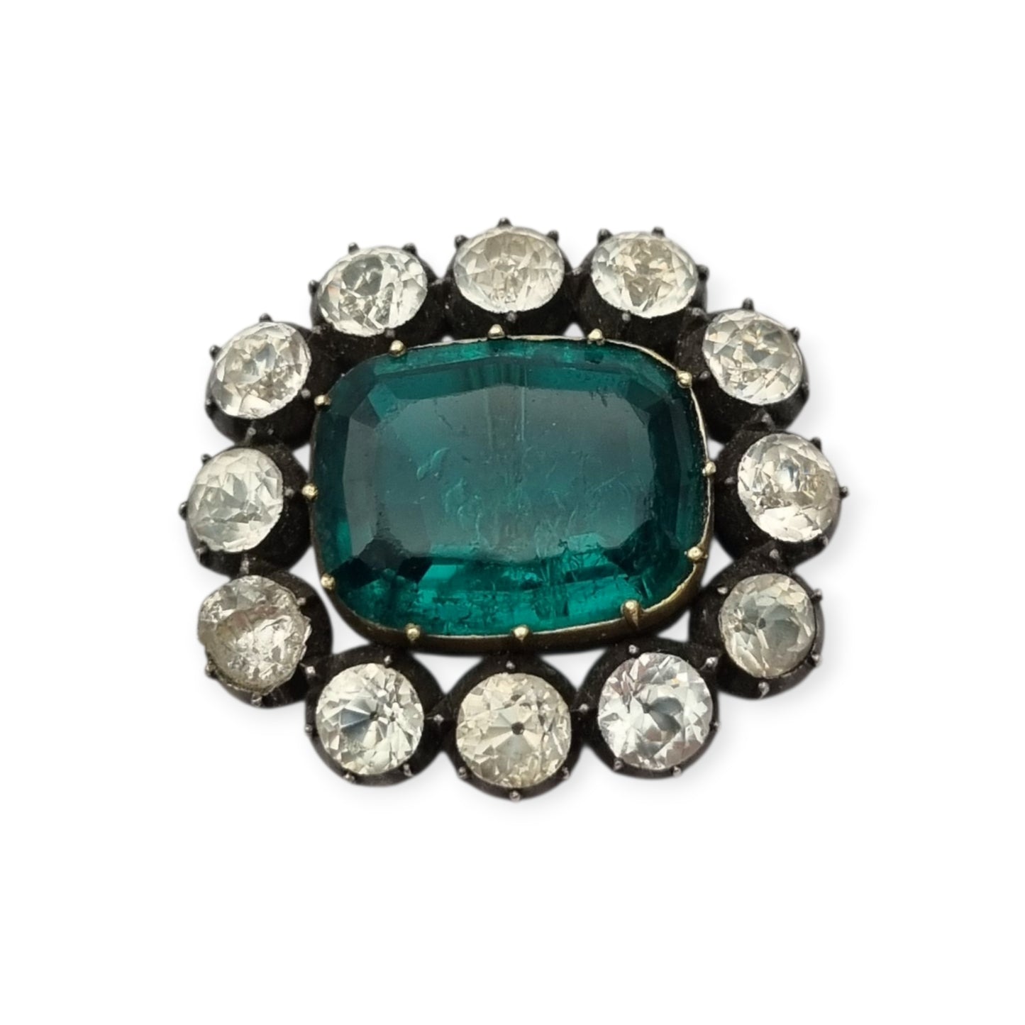 Antique Victorian silver, gold, and green and white paste brooch, inspired by the aesthetics of Queen Victoria's jewelry. Europe, circa 1890