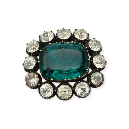 Antique Victorian silver, gold, and green and white paste brooch, inspired by the aesthetics of Queen Victoria's jewelry. Europe, circa 1890