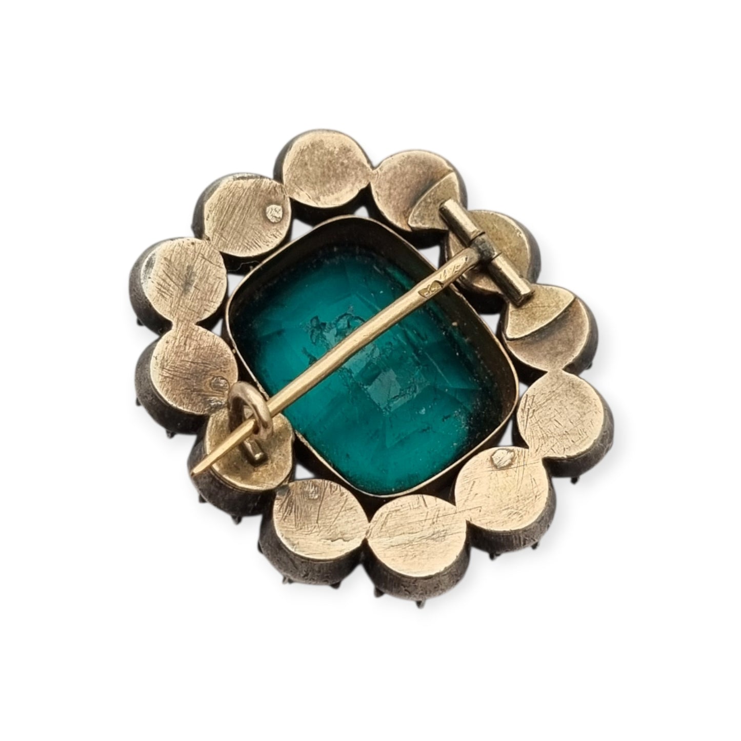 Antique Victorian silver, gold, and green and white paste brooch, inspired by the aesthetics of Queen Victoria's jewelry. Europe, circa 1890