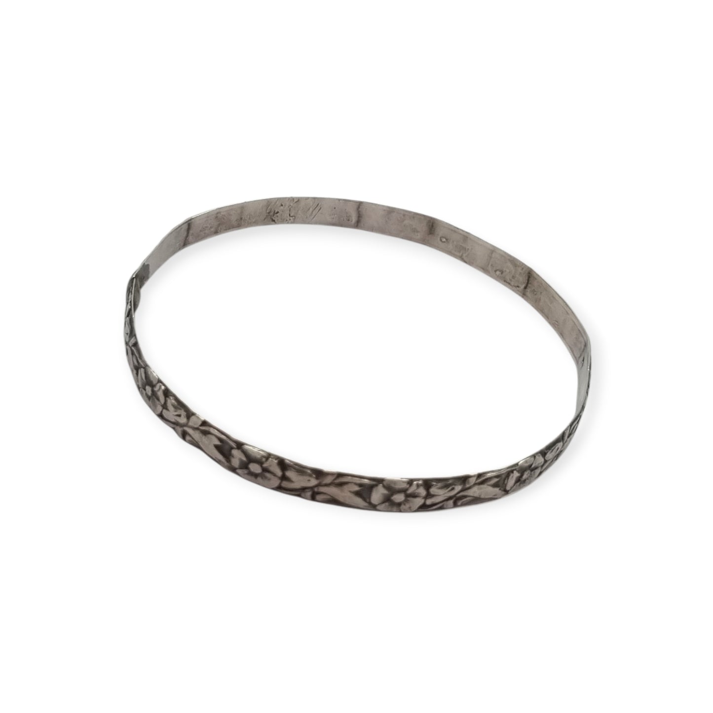 Pulsera vintage de plata con flores repujadas de inspiración floral circa 1950
