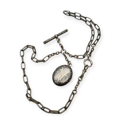 Antigua Cadena Albert completa de plata nielada para reloj de bolsillo con guardapelo monogramado  circa 1890