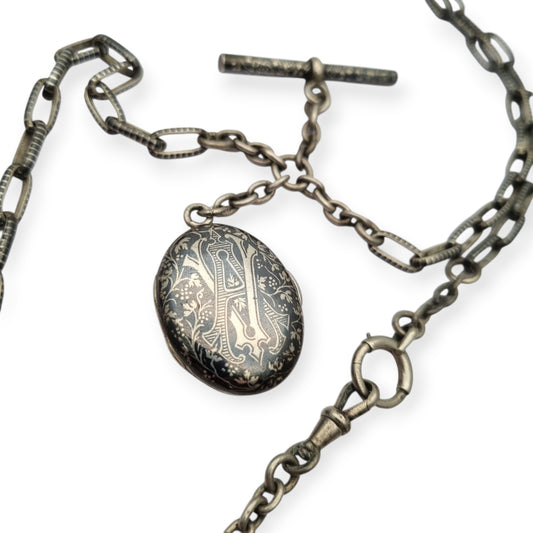 Antigua Cadena Albert completa de plata nielada para reloj de bolsillo con guardapelo monogramado  circa 1890