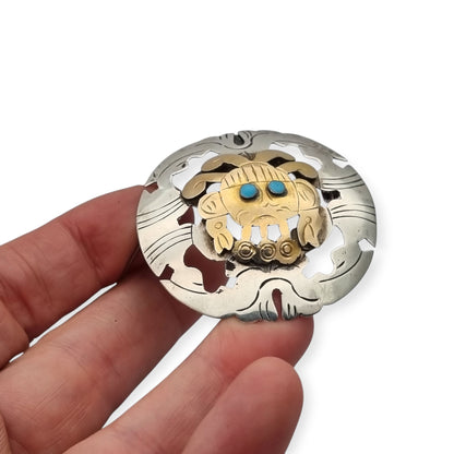 Peruvian 925 silver and 18K gold pendant brooch with pre-Columbian mask and turquoise cabochons, circa 1965–1975