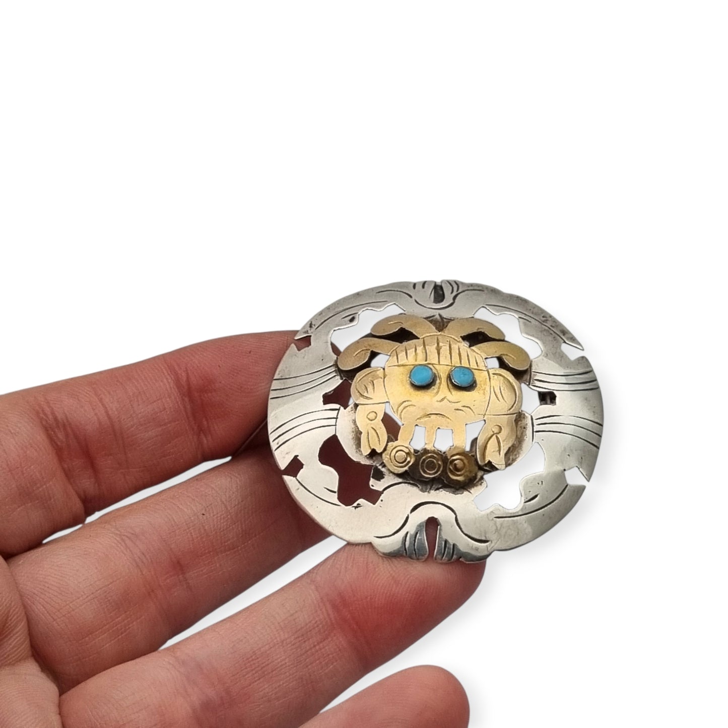 Peruvian 925 silver and 18K gold pendant brooch with pre-Columbian mask and turquoise cabochons, circa 1965–1975