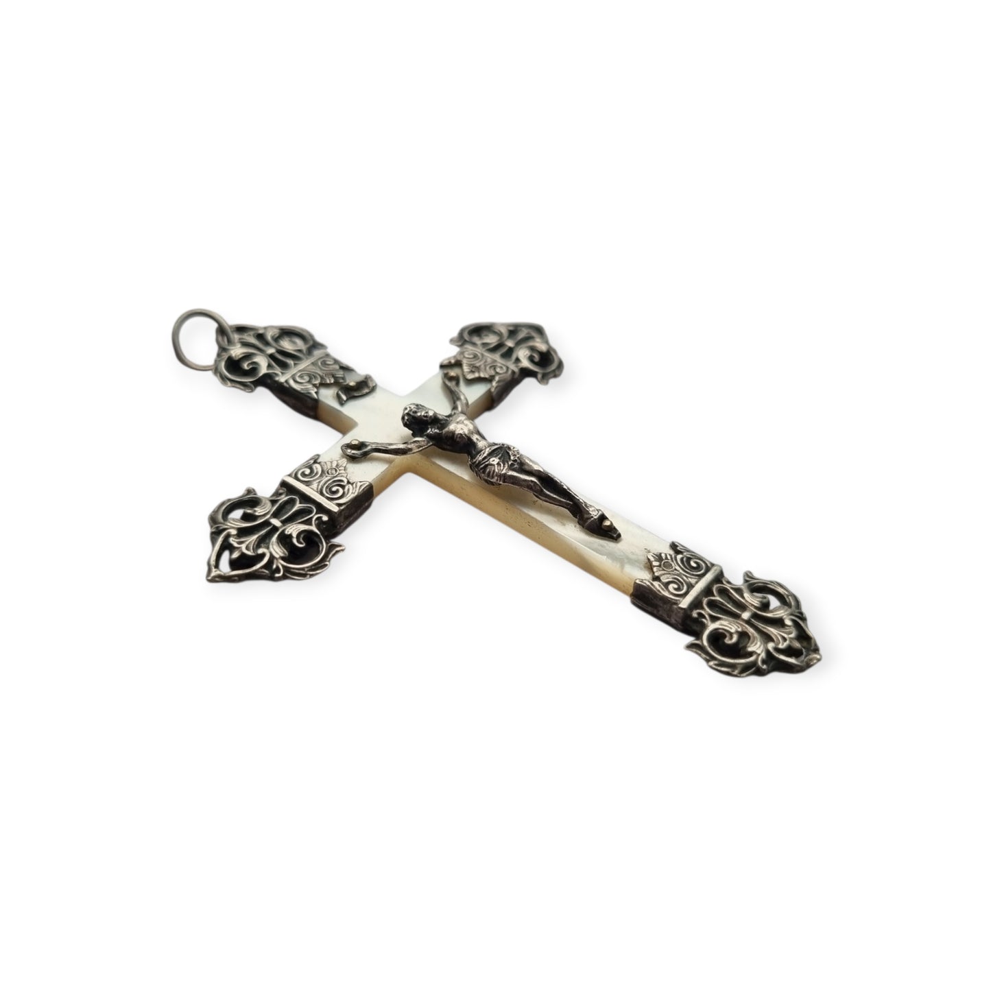 Antique French Catholic crucifix in silver and mother-of-pearl with Christ and openwork finials, circa 1900–1930