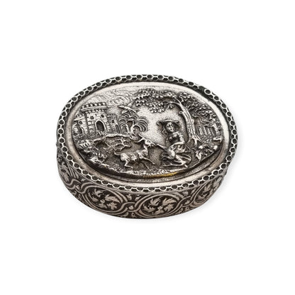 Rococo Revival oval silver box with gilt interior and pastoral scene in relief, circa 1940–1950