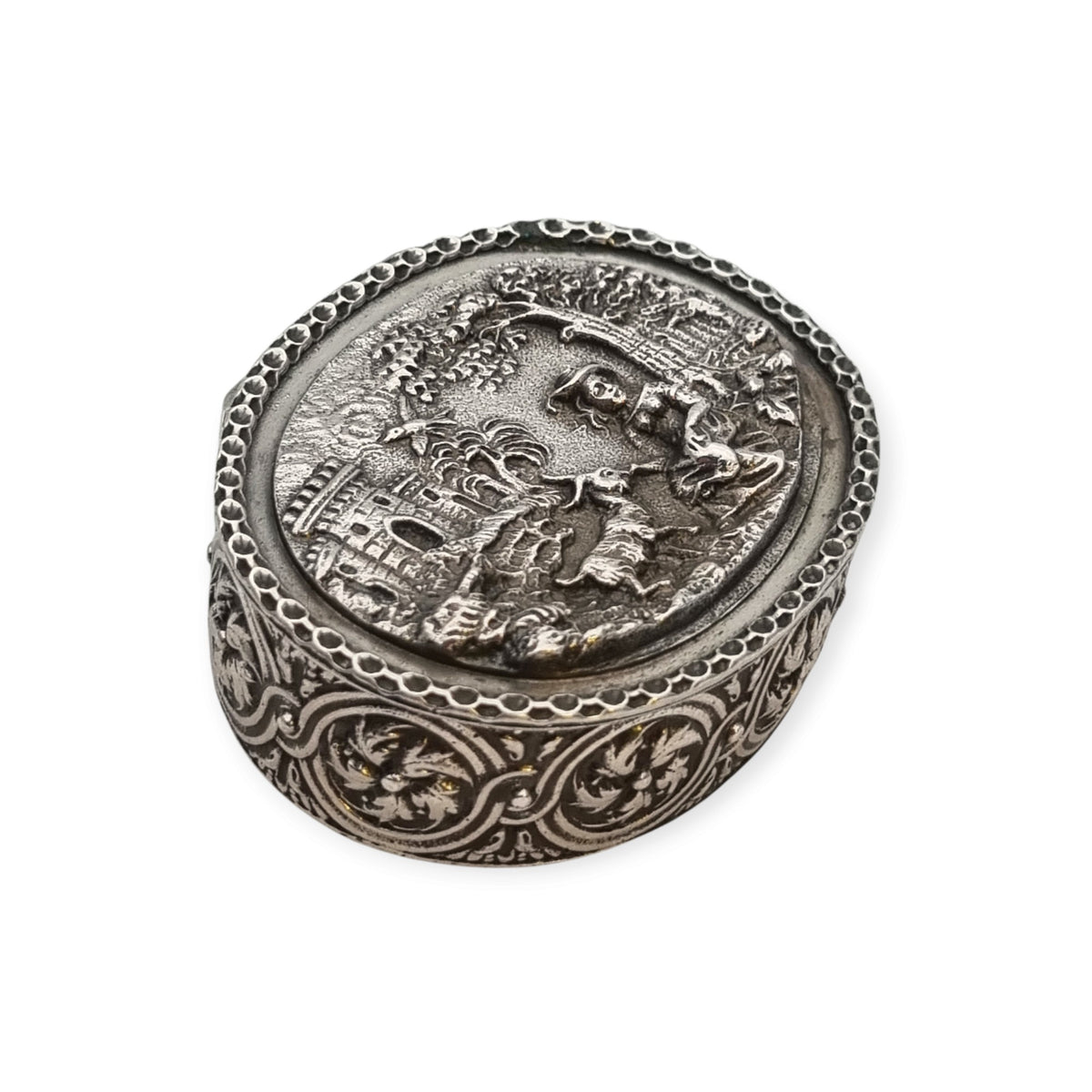 Rococo Revival oval silver box with gilt interior and pastoral scene in relief, circa 1940–1950