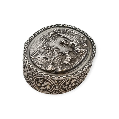 Rococo Revival oval silver box with gilt interior and pastoral scene in relief, circa 1940–1950