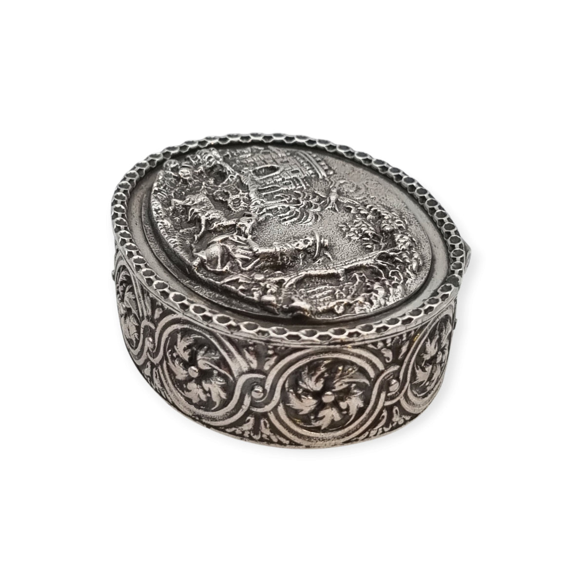 Rococo Revival oval silver box with gilt interior and pastoral scene in relief, circa 1940–1950