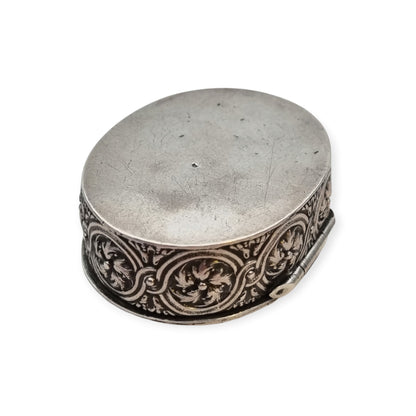 Rococo Revival oval silver box with gilt interior and pastoral scene in relief, circa 1940–1950