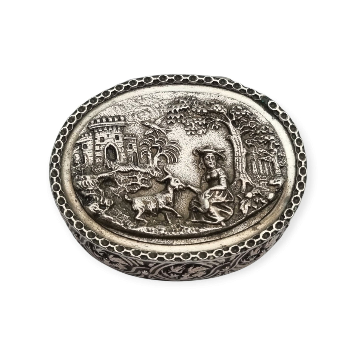 Rococo Revival oval silver box with gilt interior and pastoral scene in relief, circa 1940–1950