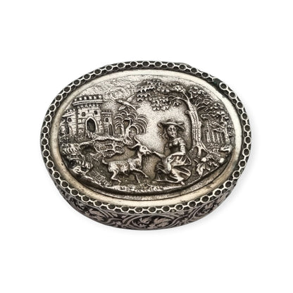 Rococo Revival oval silver box with gilt interior and pastoral scene in relief, circa 1940–1950