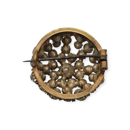 Vintage Art Deco circular button brooch in gold-tone metal and rhinestones, circa 1930-40
