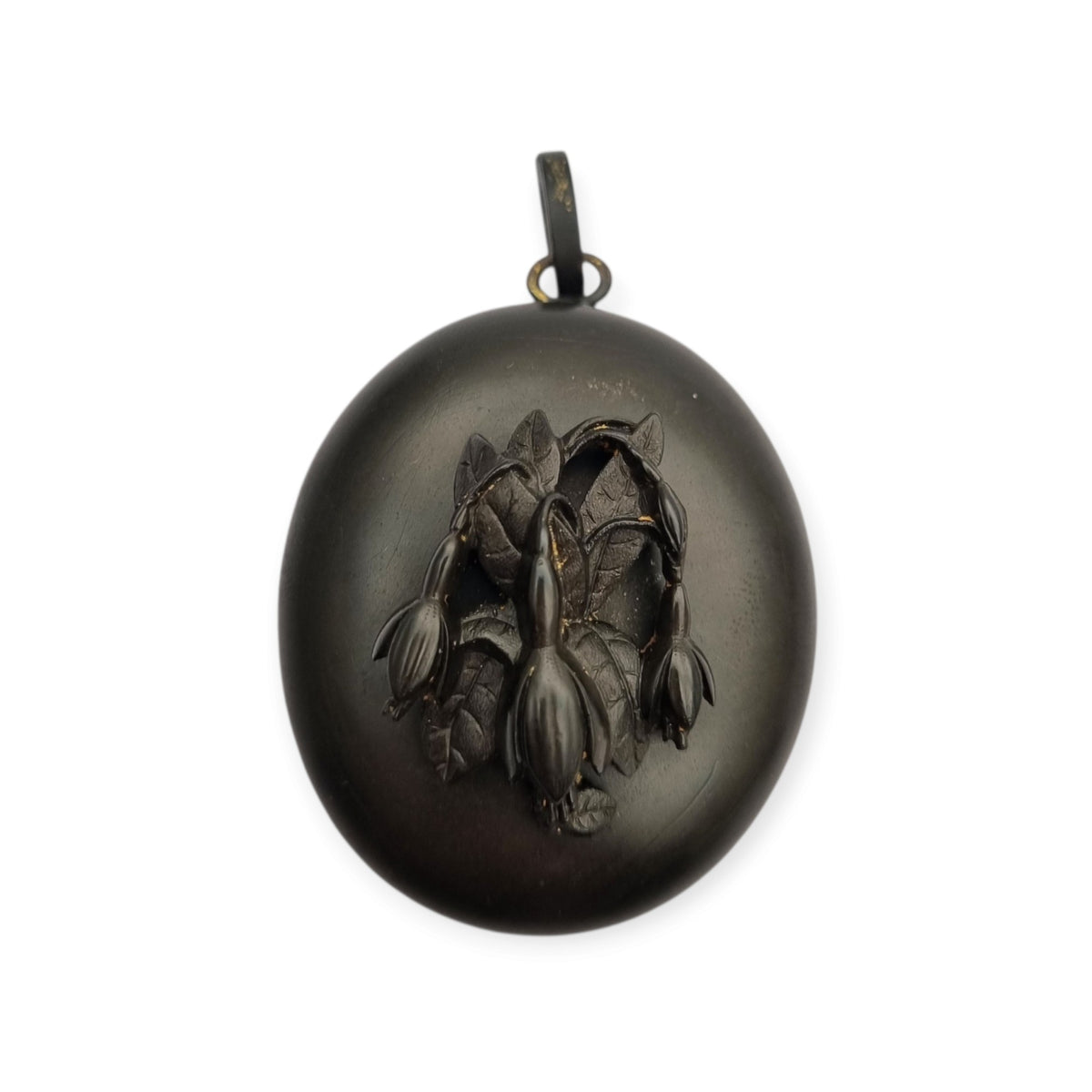 Victorian black vulcanite mourning locket with high-relief flowers, England, c. 1880–1900