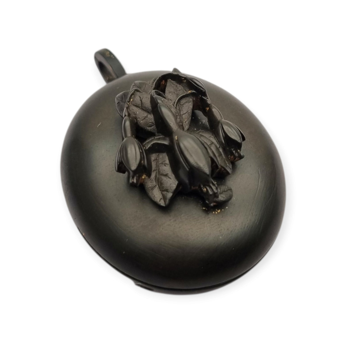 Victorian black vulcanite mourning locket with high-relief flowers, England, c. 1880–1900