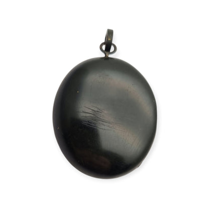 Victorian black vulcanite mourning locket with high-relief flowers, England, c. 1880–1900