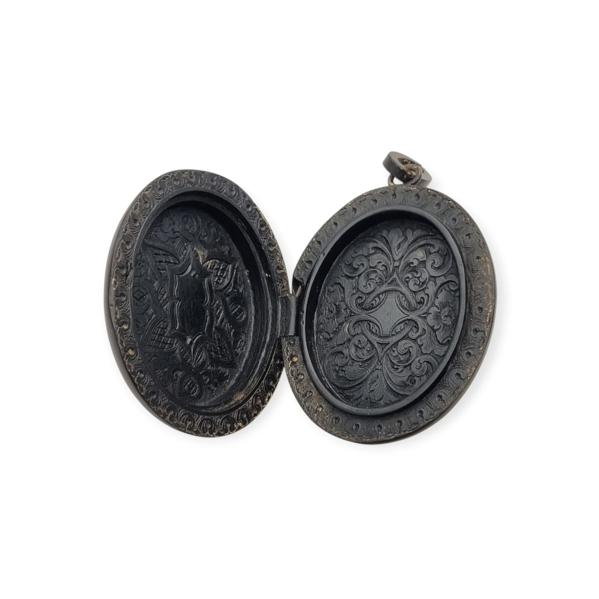 Victorian black vulcanite mourning locket with high-relief flowers, England, c. 1880–1900