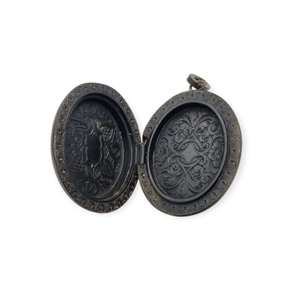 Victorian black vulcanite mourning locket with high-relief flowers, England, c. 1880–1900