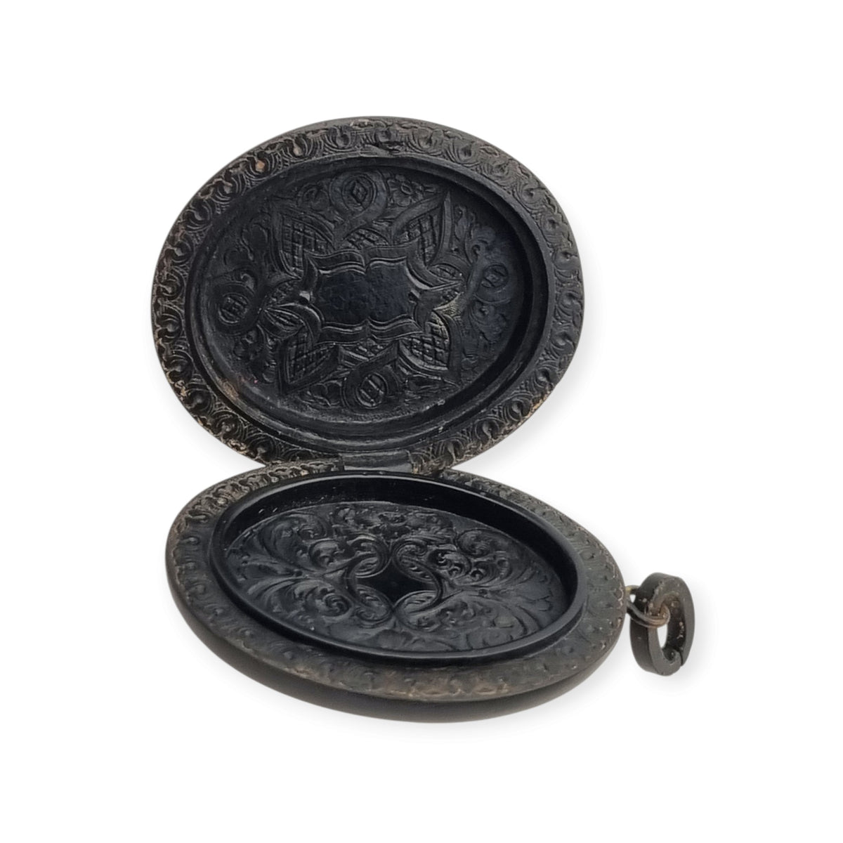 Victorian black vulcanite mourning locket with high-relief flowers, England, c. 1880–1900