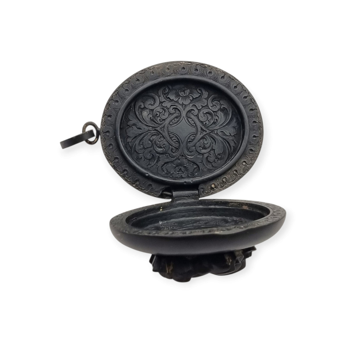 Victorian black vulcanite mourning locket with high-relief flowers, England, c. 1880–1900