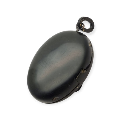Victorian black vulcanite mourning locket with high-relief flowers, England, c. 1880–1900