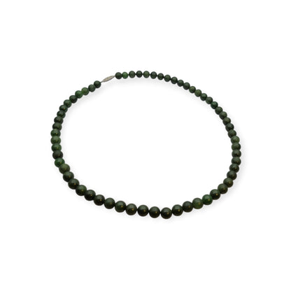 Long vintage nephrite green jade necklace with spherical beads Circa 1950