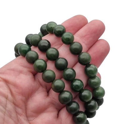 Long vintage nephrite green jade necklace with spherical beads Circa 1950