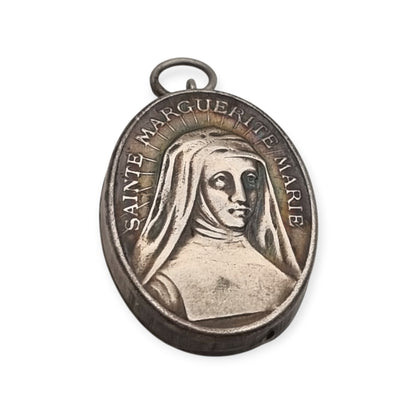 Antique silver reliquary containing a relic of Saint Margaret Mary Alacoque, engraved frame · France, ca. 1920–1940