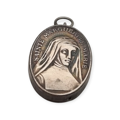 Antique silver reliquary containing a relic of Saint Margaret Mary Alacoque, engraved frame · France, ca. 1920–1940
