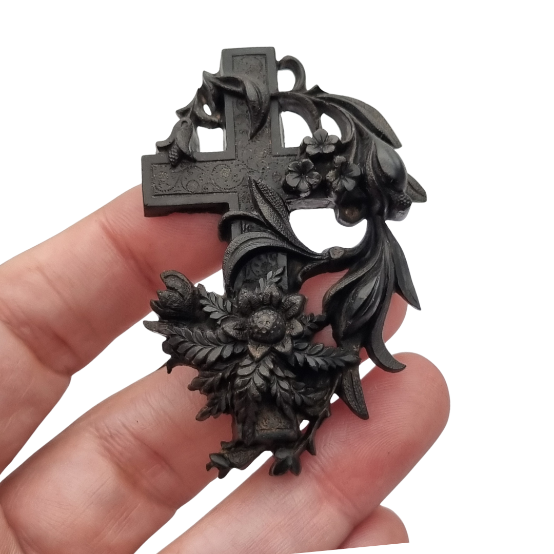 Victorian vulcanite mourning brooch, cross with ivy and flowers, England, circa 1880-1900