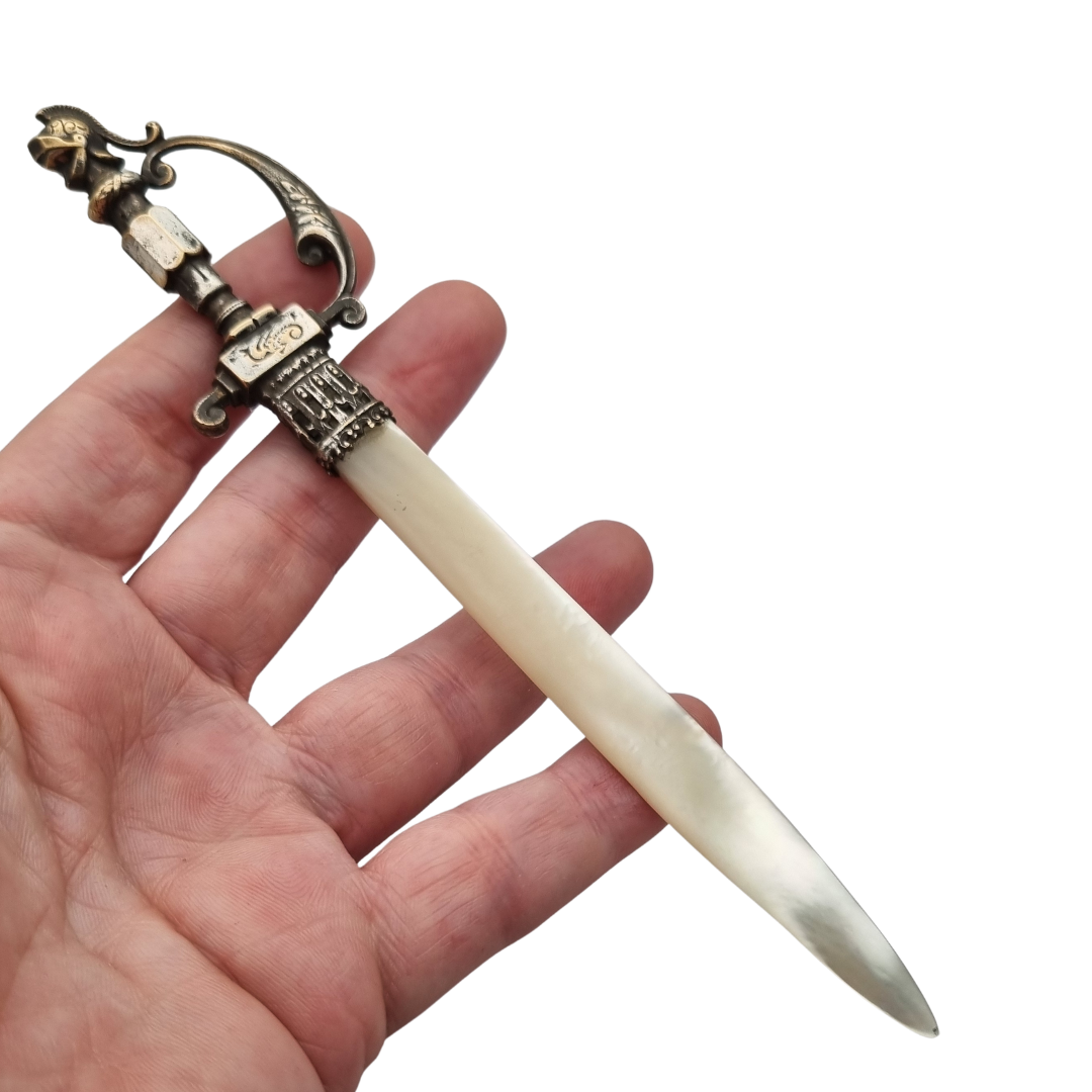 French Fourvière letter opener with mother-of-pearl blade and two-tone handle, Neo-medieval style circa 1900–1930