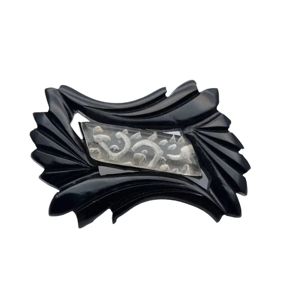 Broche vintage de baquelita en blanco y negro tallas geométricas para la solapa