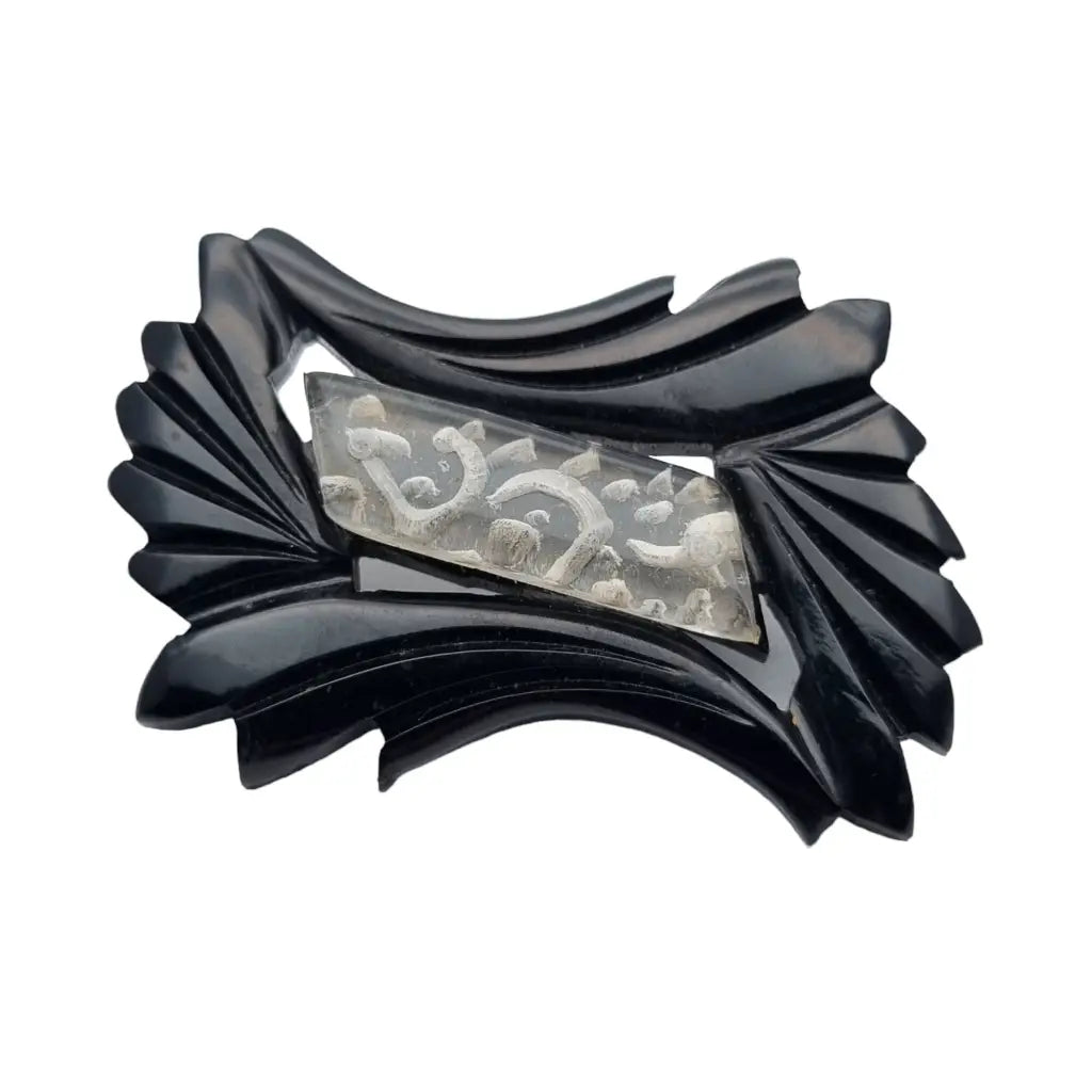 Broche vintage de baquelita en blanco y negro tallas geométricas para la solapa