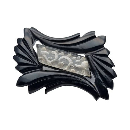 Broche vintage de baquelita en blanco y negro tallas geométricas para la solapa
