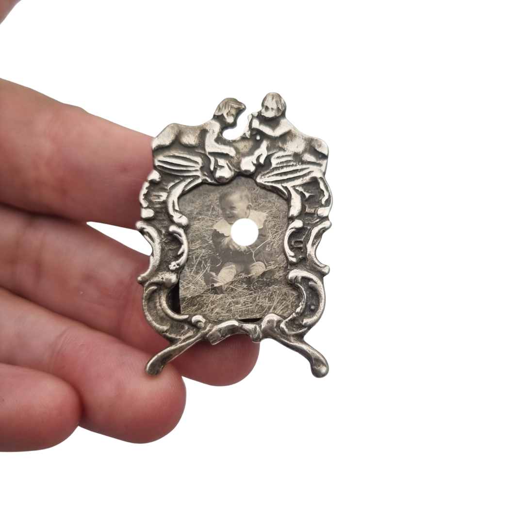Antique Italian 800 silver children's photo frame, circa 1960, decorative babies