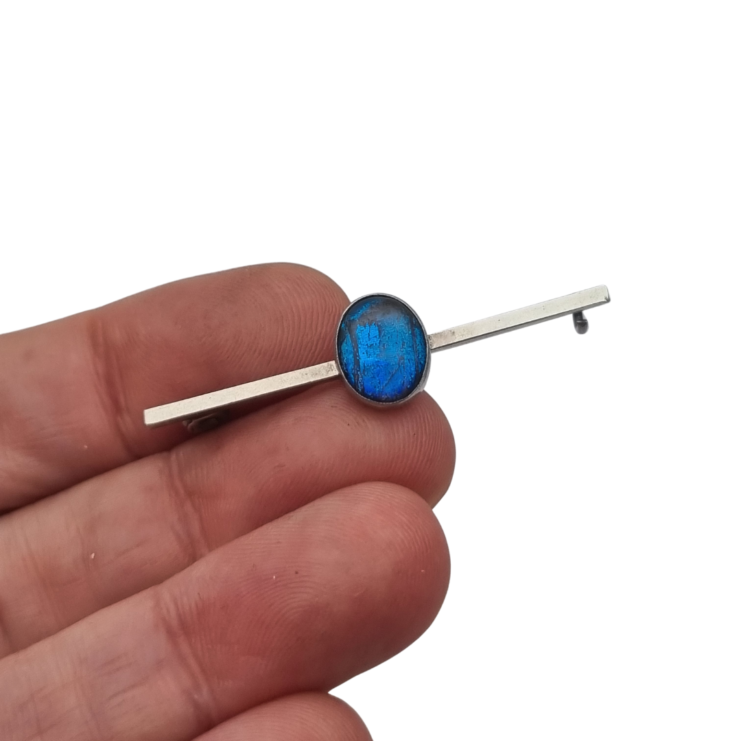 Antique silver brooch with oval blue cabochon, minimalist 20th-century design