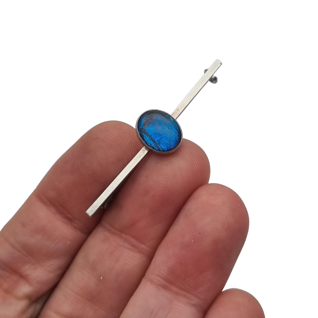 Antique silver brooch with oval blue cabochon, minimalist 20th-century design