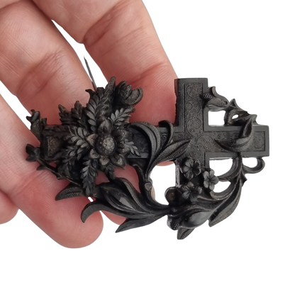 Victorian vulcanite mourning brooch, cross with ivy and flowers, England, circa 1880-1900